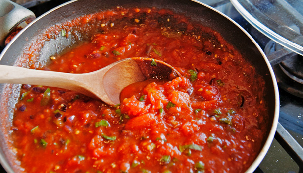 Homemade sauce with overripe tomatoes