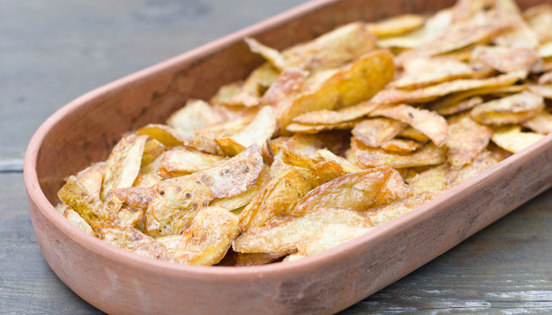 Crispy potato skins in crockery