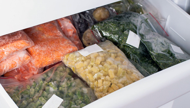 Assortment of frozen vegetables in a refrigerator