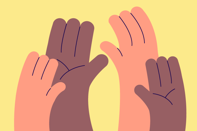 Some hands raised in the air