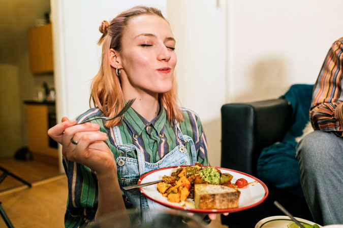 Woman savours home-made food