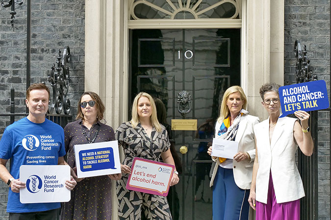 World Cancer Research Fund, AHA and our supporters at No10 Downing Street handing in our petition