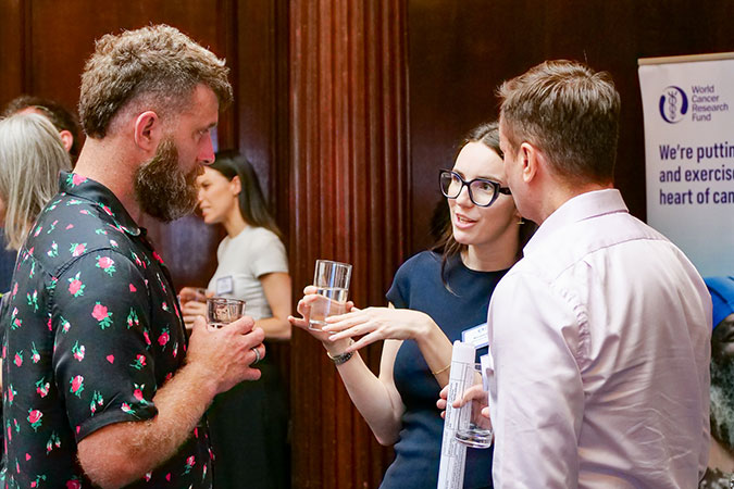 Staff chatting with a supporter