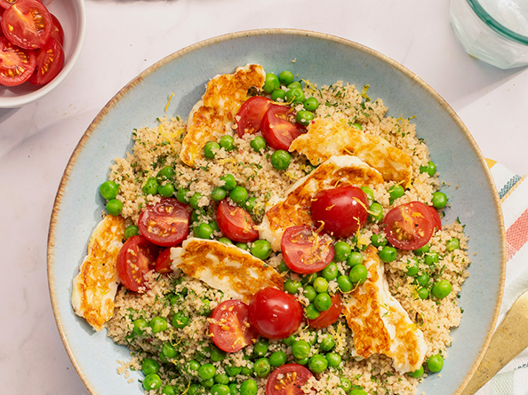Lemon, pea, tomato and halloumi couscous